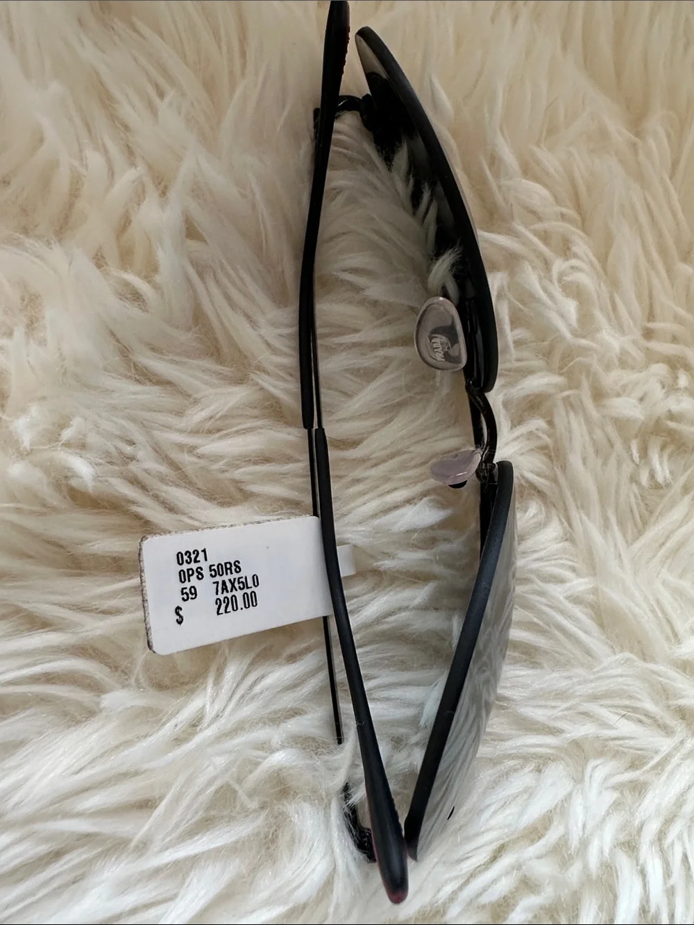 Prada Men’s Black and Silver Rimless Sunglasses